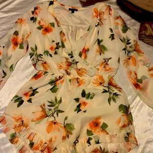 Floral short romper- worn twice. Very feminine yet sexy